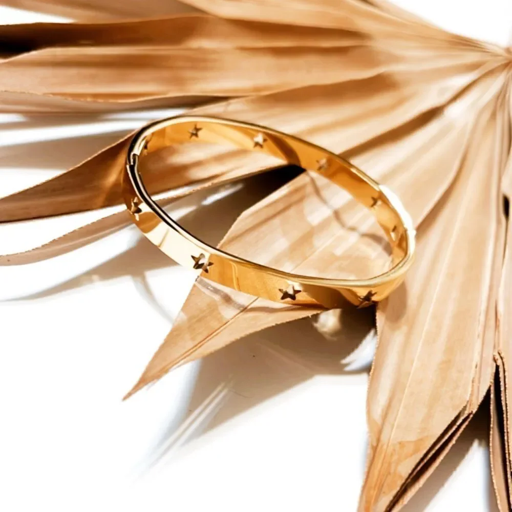 Gold star bangle  S419